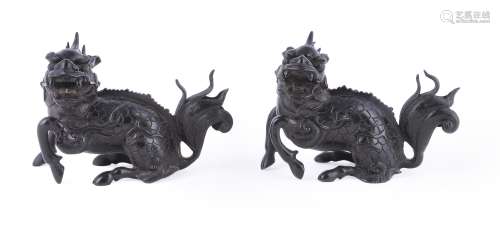 A pair of Chinese bronze qilins