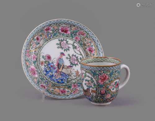 A fine Chinese porcelain Famille Rose loop-handled cup and s...