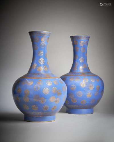 A pair of Chinese gilt-decorated blue ground bottle vases
