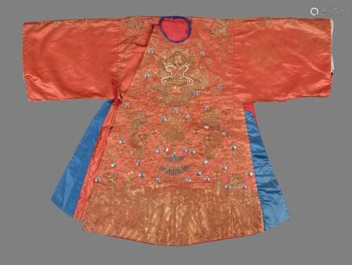 A Chinese coral ground child's silk dragon robe