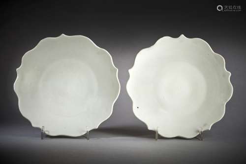 A fine pair of white-glazed five-petalled foliate dishes
