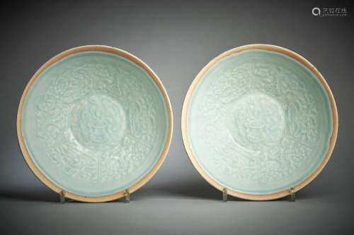 A pair of Chinese qingbai moulded bowls