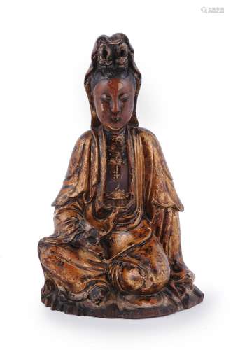 A Chinese gilt-lacquer and carved wood figure of Guanyin