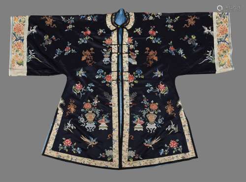 A Chinese midnight blue satin silk lady's front opening robe