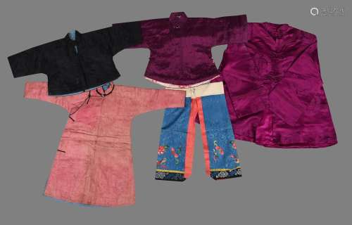 A group of four children's robes and jackets and a pair of b...