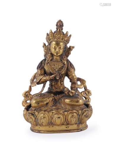 A Sino-Tibetan gilt-bronze figure of Vajradhara