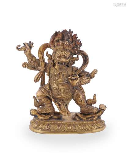 A Sino-Tibetan gilt bronze figure of Mahakala