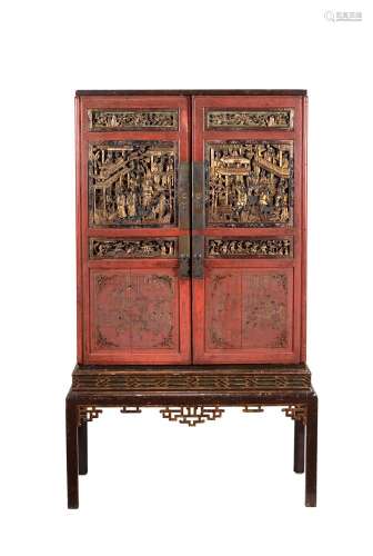 A Chinese red lacquered cabinet on stand