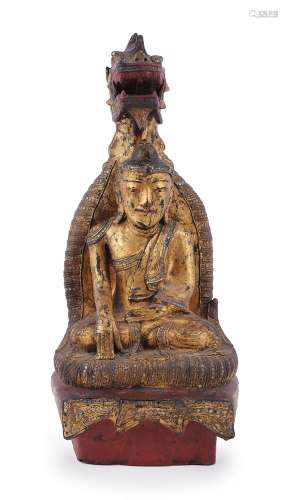 A Burmese paste-embellished gilt and lacquer wood figure of ...