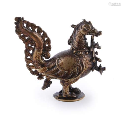 An attractive Indian bronze finial in the form of a mythical...