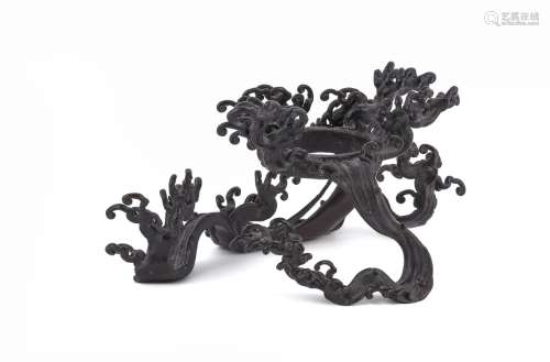 An attractive Japanese bronze 'breaking wave' vase stand