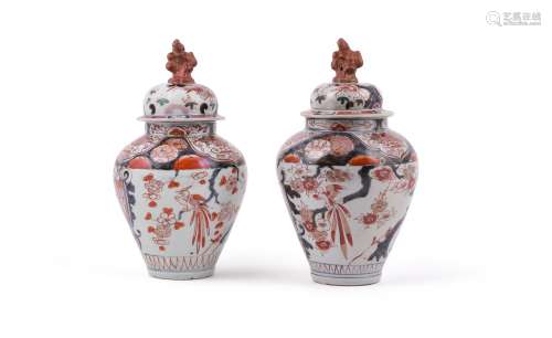 A pair of Japanese Arita vases and covers