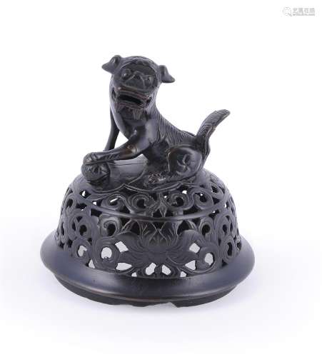 A Chinese bronze censer cover