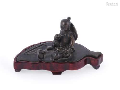 A Chinese bronze 'Fisherman' scroll weight