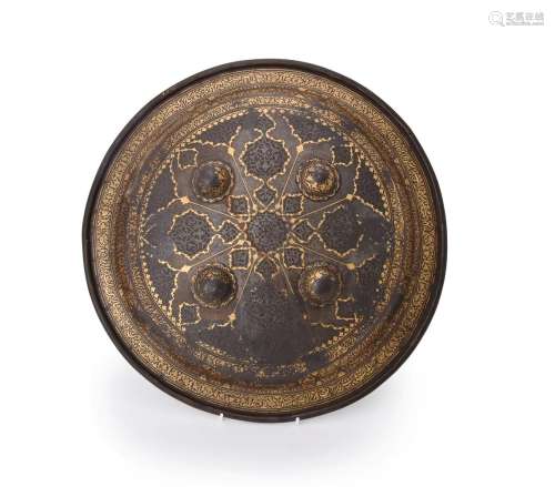 A Qajar gold damascened steel shield