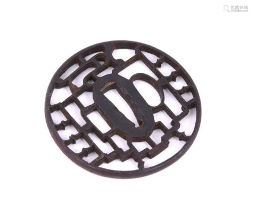 A Japanese Iron Kyo-Sukashi Tsuba of circular form pierced i...