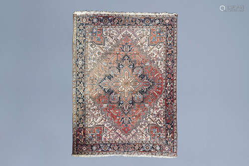 An Oriental Heriz rug, wool on cotton, Northwest Persia, fir...