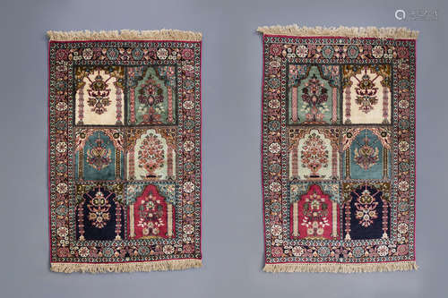 A pair of Oriental rugs with floral design, Kashmir, 20th C.