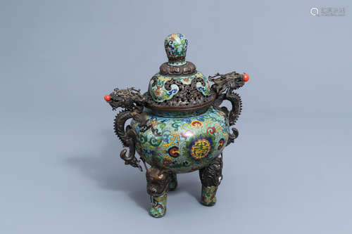 A Chinese cloisonne tripod incense burner and cover with dra...