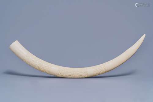 A carved ivory tusk with ornamental design, first half 20th ...