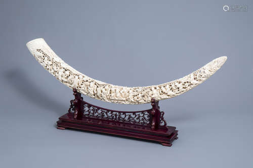 An exceptionally large Chinese carved ivory 'Immortals tusk'...