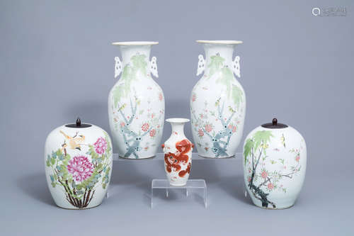 Four Chinese famille rose vases and an iron red vase with li...