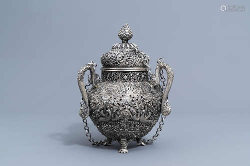 A Sino-Tibetan reticulated silver incense burner and cover, ...