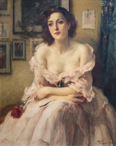 Fernand Toussaint (1873-1956): A young lady with a rose in a...