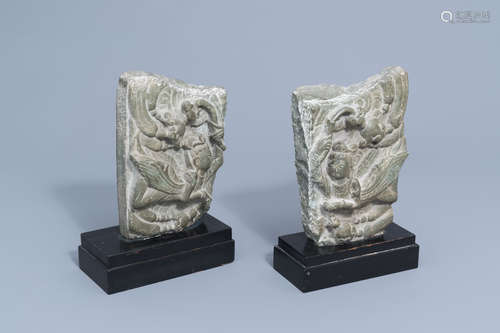 Two Chinese carved stone fragments with winged ladies, 20th ...