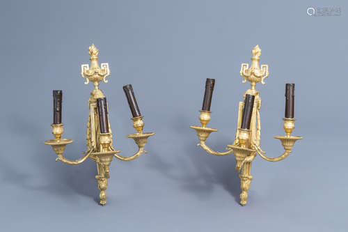 A pair of French Louis XVI ormolu lights in the manner of Je...