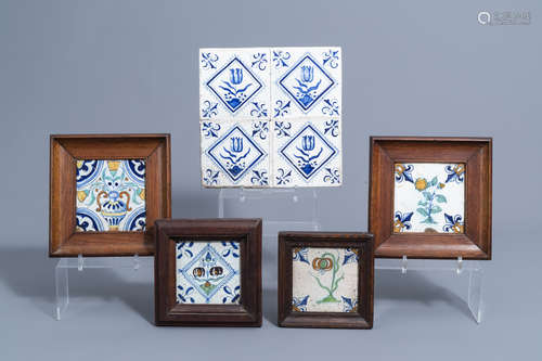 Eight Dutch Delft blue, white and polychrome tiles with flow...