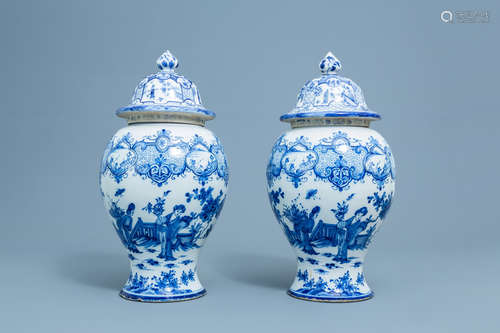 A pair of Dutch Delft blue and white 'chinoiserie' vases and...