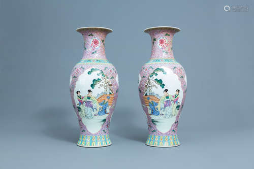 A pair of Chinese famille rose baluster vases, 20th C.