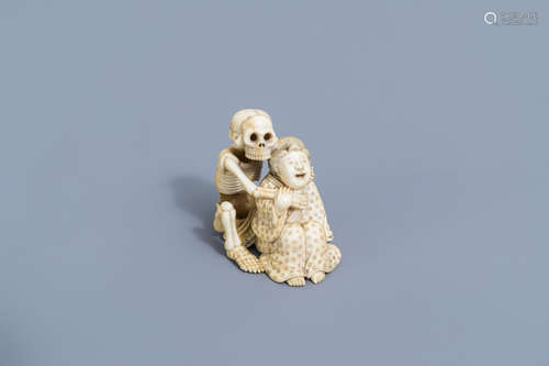 A Japanese ivory okimono with a skeleton and a lady, signed ...