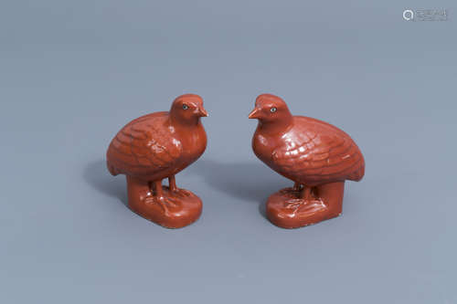 A pair of Chinese coral red models of quails, Qianlong/Jiaqi...