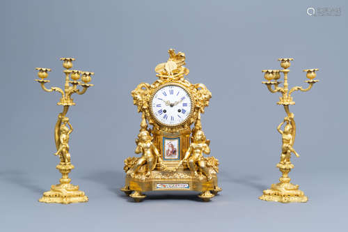 A French gilt bronze mounted Sevres style clock and a pair o...