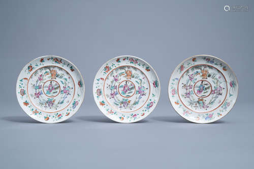 Three Chinese famille rose plates with figures in a landscap...