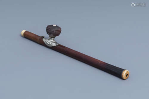 A Chinese bamboo opium pipe, an ivory mouth- and endpiece an...