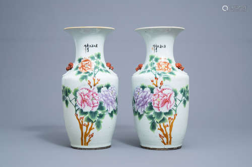 A pair of Chinese famille rose vases with floral design, 19t...