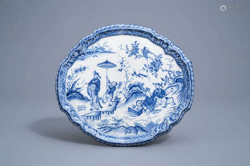 A Dutch Delft blue and white 'chinoiserie' plaque, 18th C.