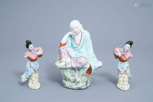 A Chinese famille rose figure of Buddha and a pair of ladies...