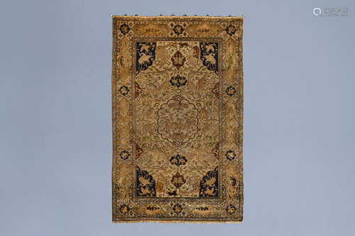 A lavish Oriental rug with animals and floral design, silk a...