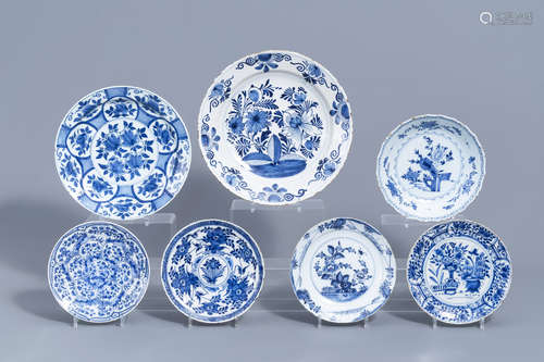 Two Dutch Delft blue and white chargers and five plates with...