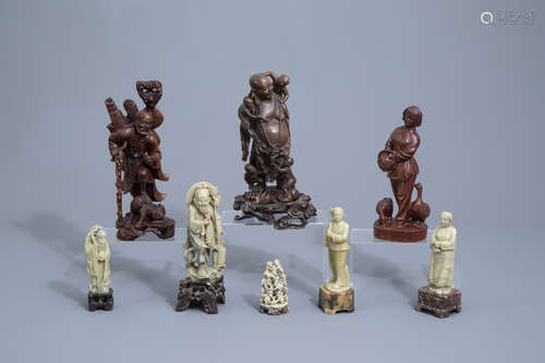 Five Chinese soapstone figures and three in carved wood, 19t...