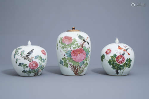 Three Chinese qianjiang cai ginger jars with a bird among bl...