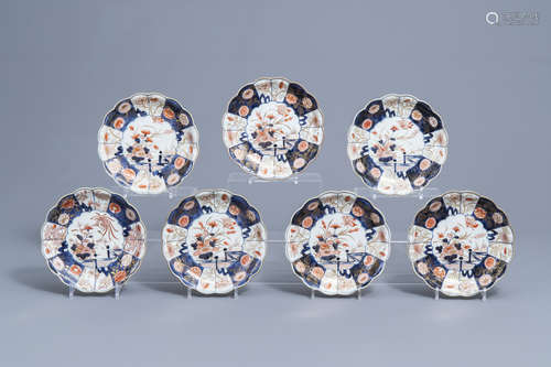 Seven Japanese Imari plates with scalloped rim and floral de...