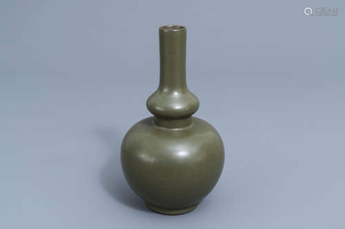 A Chinese monochrome 'teadust' double gourd vase, Qianlong m...