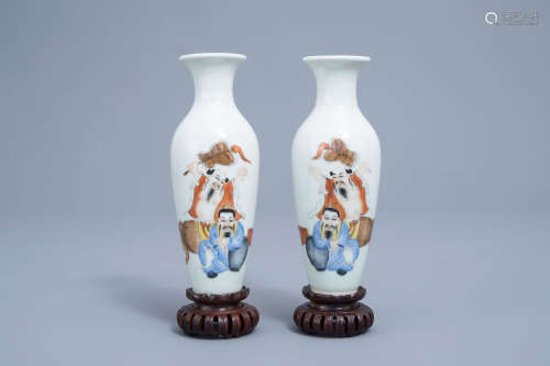 A pair of Chinese polychrome vases on wooden bases, Wan Yu m...