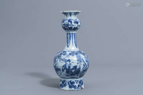 A Dutch Delft blue and white 'chinoiserie' garlic neck bottl...