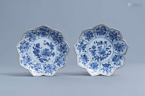 A pair of Chinese blue and white lotus dishes with floral de...